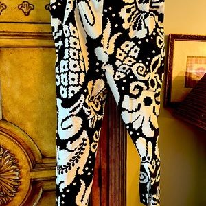 Burberry brown and white pants. Size 12. Slits at the bottom leg. NWT